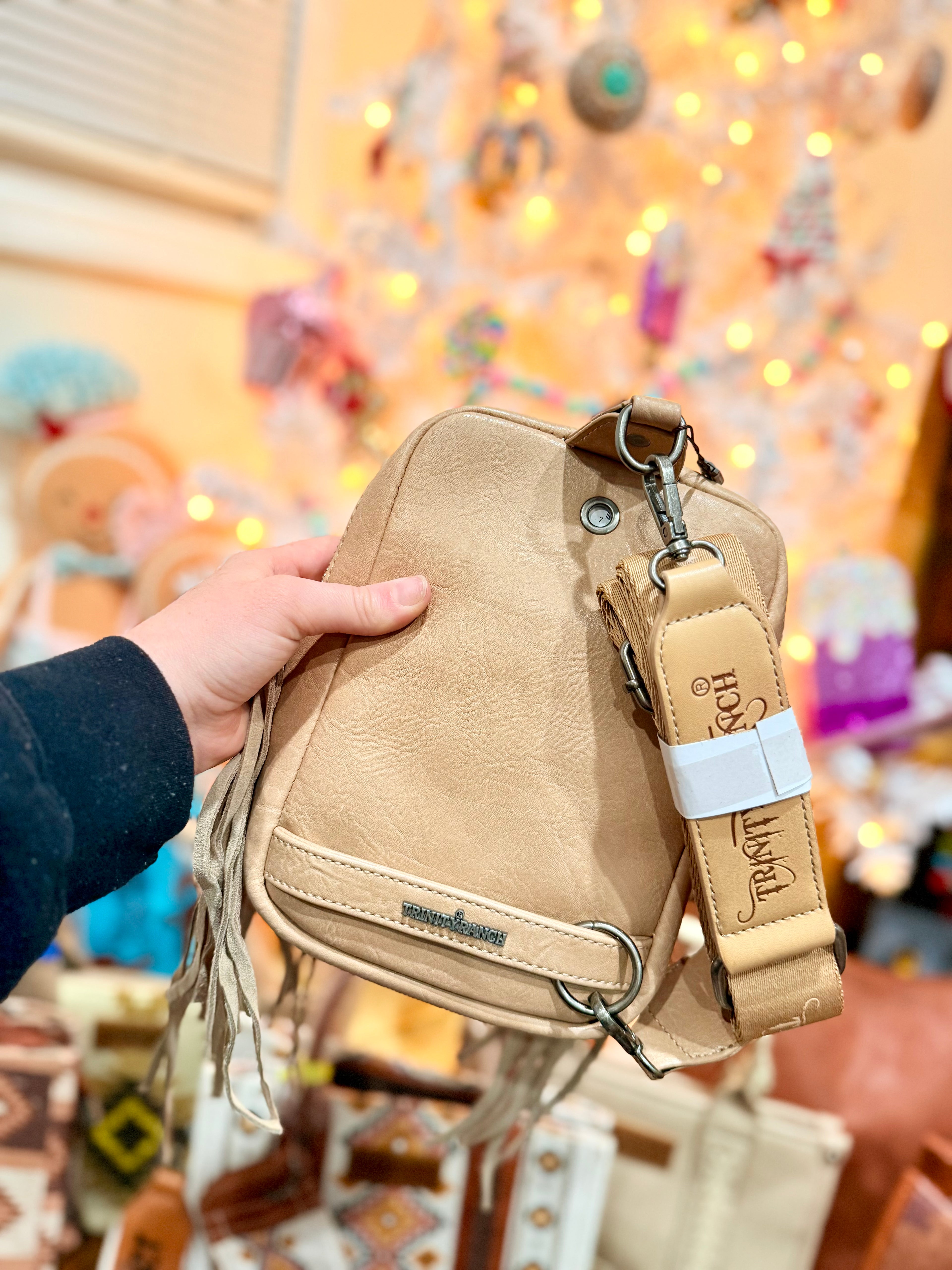 Cowhide Fringe Sling Bag