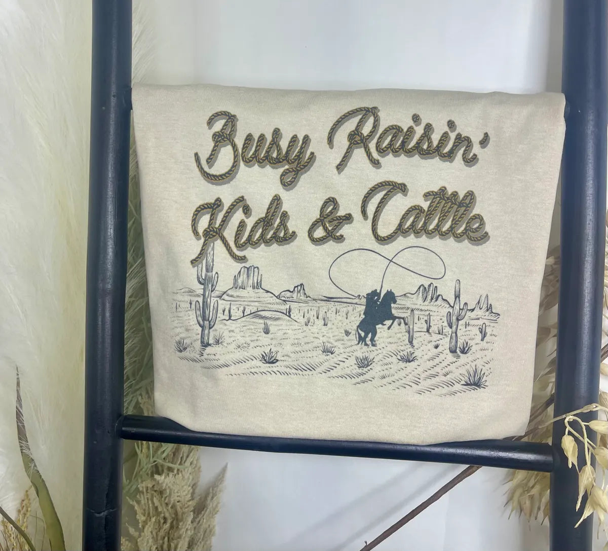 Busy Raisin’ Kids & Cattle Tee